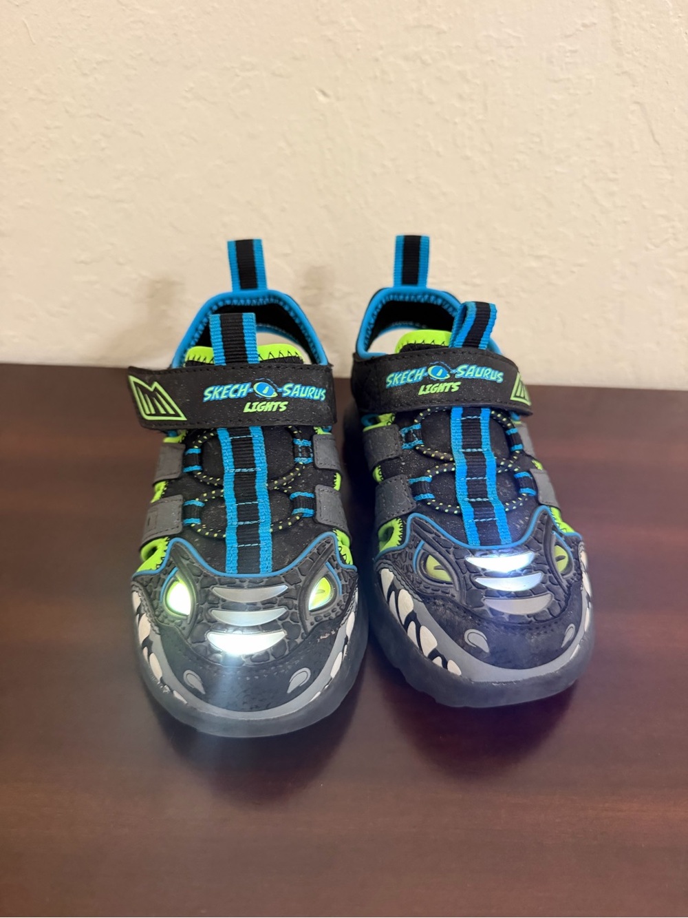 Skechers Kids Black, Blue & Neon Green Light-Up Dinosaur Sneakers
